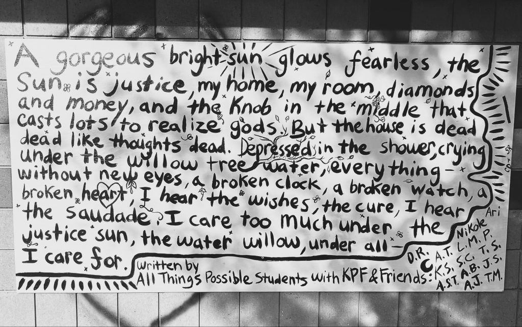 Handwritten public art displayed at Upjohn Park in Kalamazoo reflecting themes of justice, care, and lived experience.